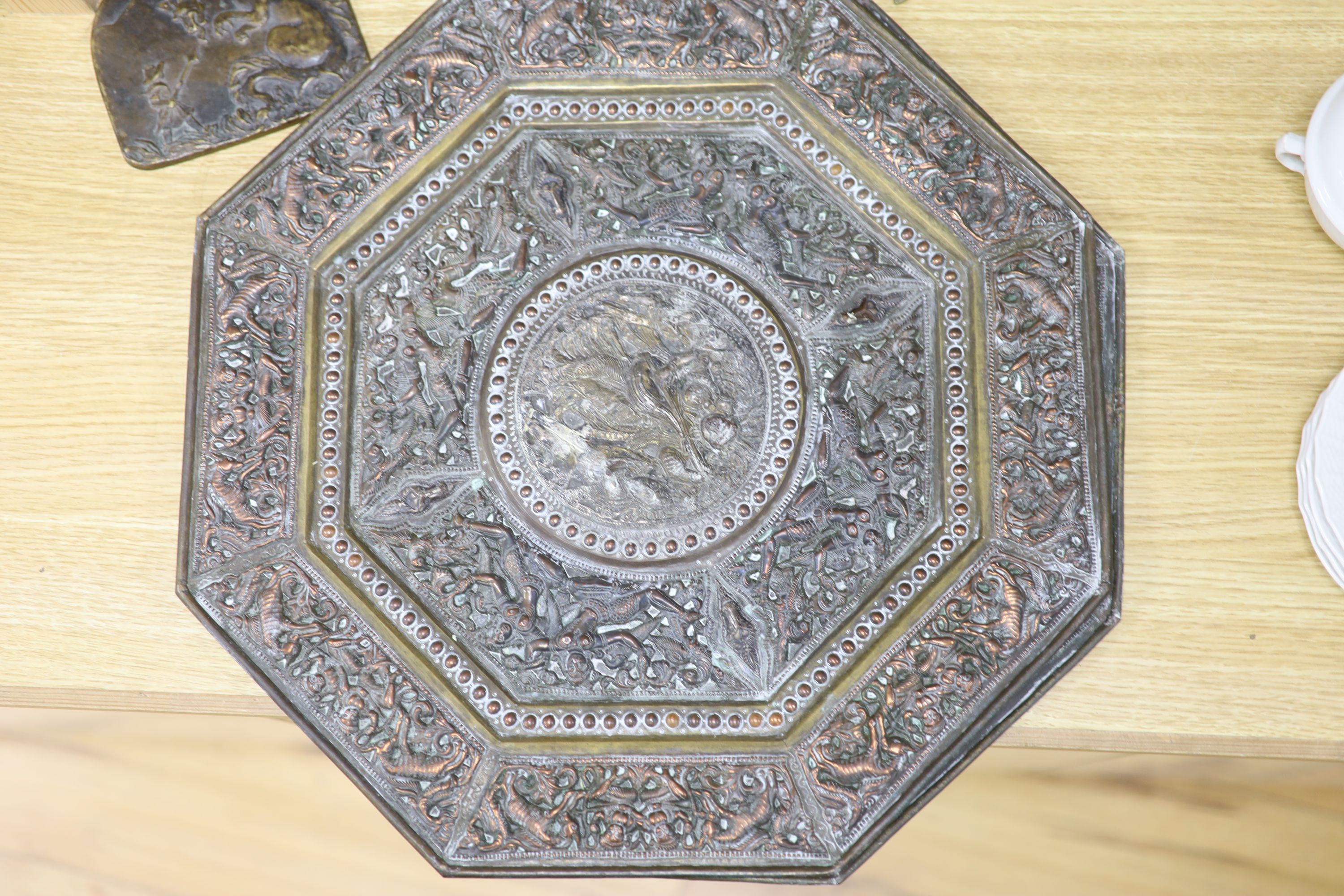 A pair of Indian cast metal trays and four other items, including a pair of octagonal embossed dishes, 46cm